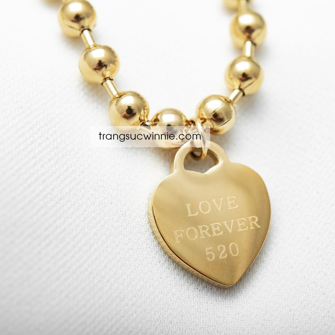  Lắc tay titan tim bi VG 