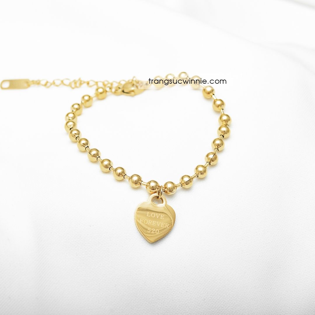  Lắc tay titan tim bi VG 