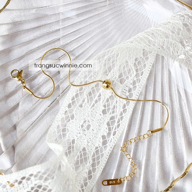  Lắc tay titan trơn mảnh dot 