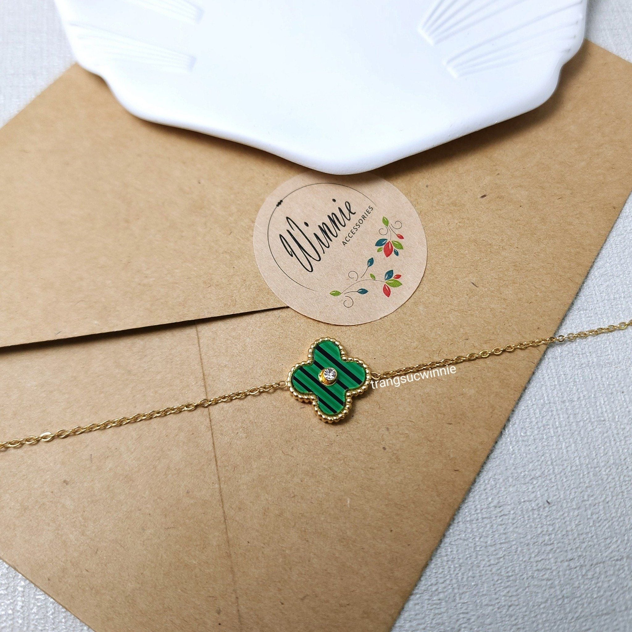  Lắc tay titan VCA xanh sọc 