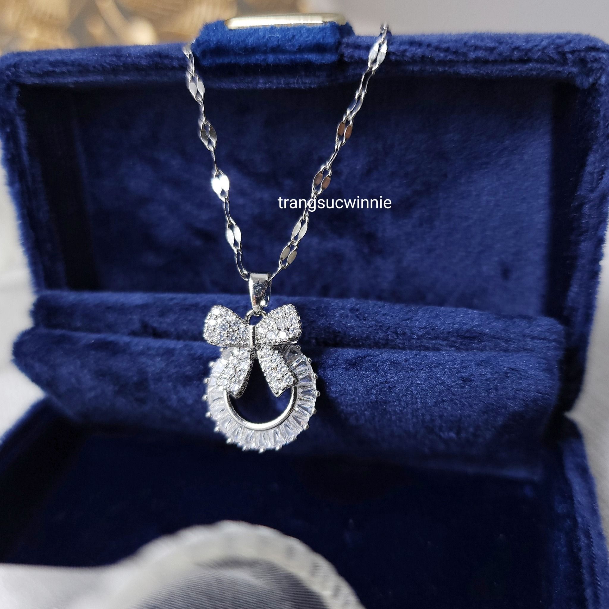  Dây chuyền titan Nơ tròn Zirconia B 