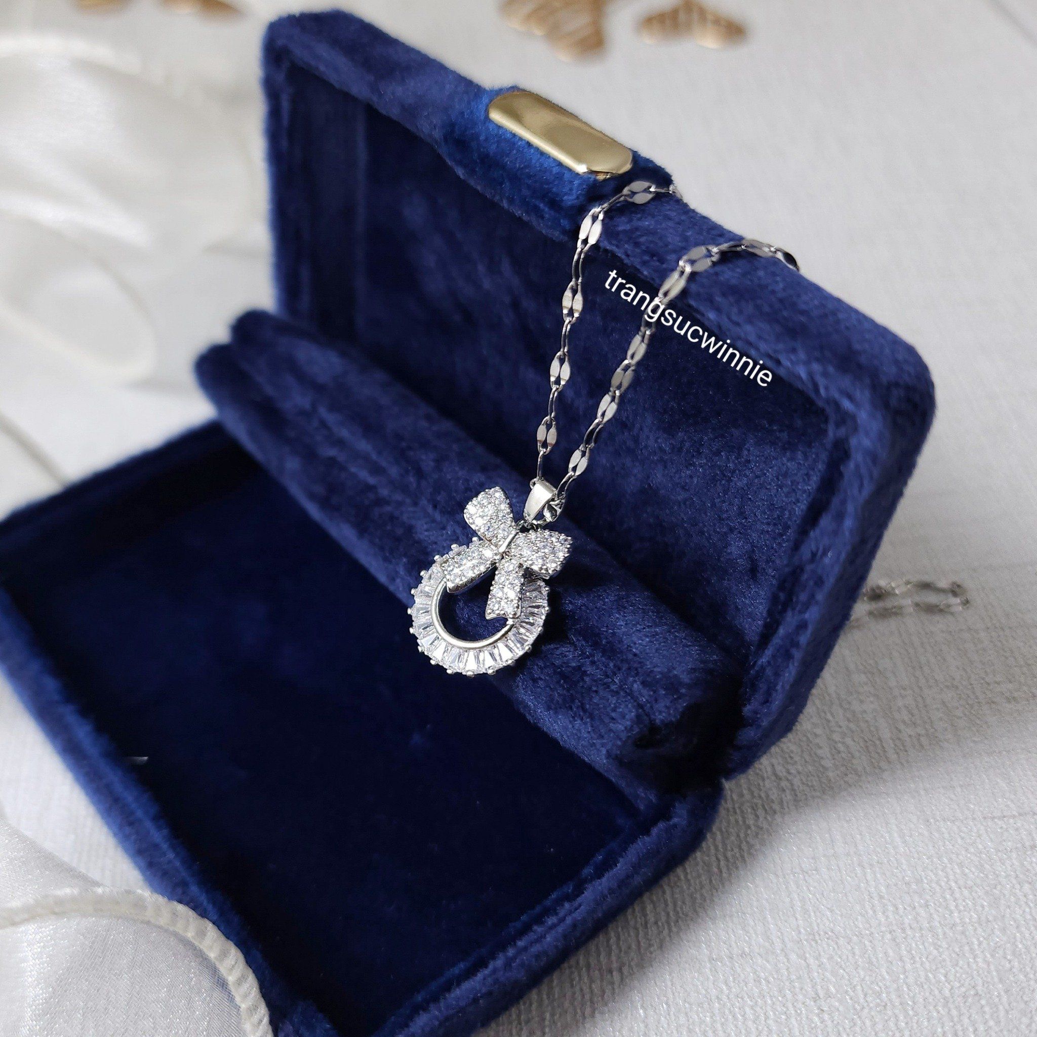  Dây chuyền titan Nơ tròn Zirconia B 