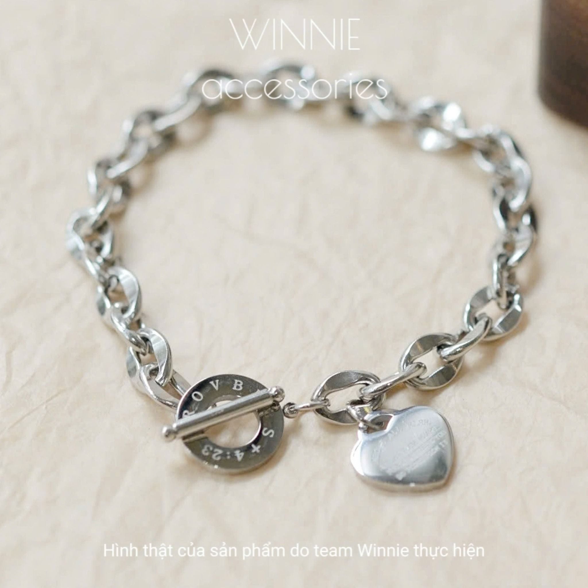  Lắc tay titan Tim OT 