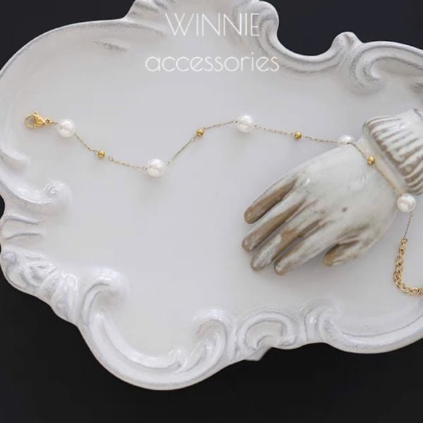  Lắc tay titan Bi pearl 