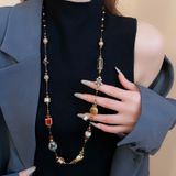  Dây chuyền Titan Ngọc trai dài Hoa Gốm 