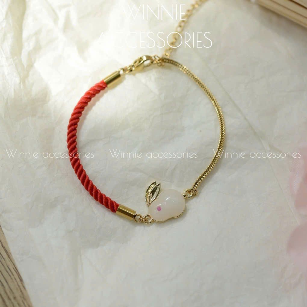  Lắc tay titan Thỏ hòa điền 