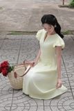 Đầm xòe cotton thêu vàng tay phồng dáng midi