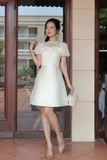 Đầm xòe tafta phối voan kem tay bí dáng midi