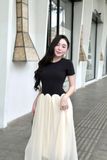 Đầm thun ôm đen tay ngắn tùng xòe dáng maxi