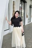 Đầm thun ôm đen tay ngắn tùng xòe dáng maxi