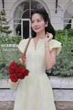 Đầm xòe cotton thêu vàng tay phồng dáng midi