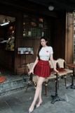 Set áo thun ôm tay ngắn phối chân váy xòe xếp ly dáng mini