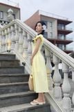 Đầm xòe cotton thêu vàng tay phồng dáng midi