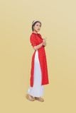 Áo dài ôm lụa in hoa nhí nền đỏ tay phồng ngắn phối nơ cổ