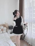 Đầm xòe nhung đen tay phối voan dáng mini