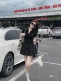 Đầm polo thun đen tùng nhún xòe dáng mini