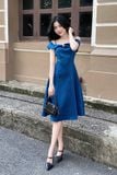 Đầm xòe bố len vai bệt có nơ gài trang trí