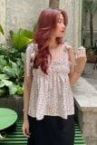 Áo xoè lụa trắng hoạ tiết cột nơ vai