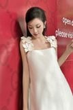 Đầm hai dây tafta đính hoa dáng mini
