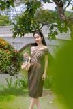 Chân váy xếp ly midi cotton lạnh chéo tà