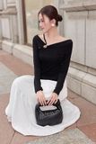 Chân váy xòe nhún tầng midi cotton