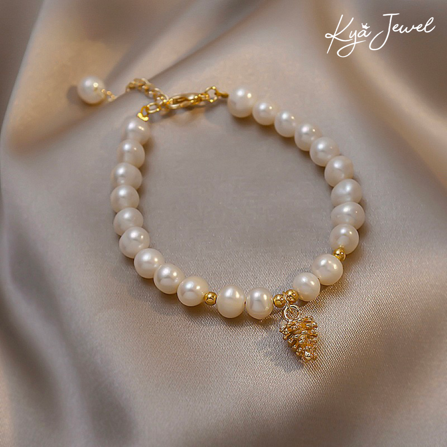  Vòng tay nữ ngọc trai và quả thông rừng 