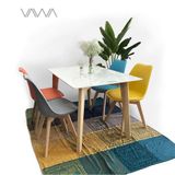  1Bộ bàn ghế ăn 4 chỗ - Bàn chữ nhật mặt đá Howard, Ghế nhựa nệm da chân gỗ Eames 