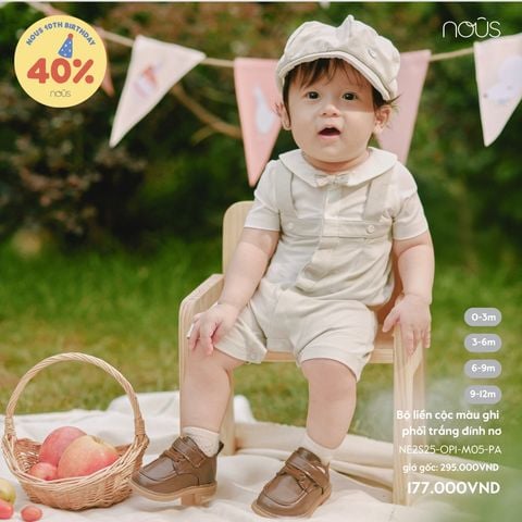 Bộ liền cộc màu ghi phối trắng đính nơ Nous Party