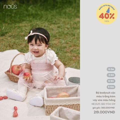 Bộ bodysuit cộc màu trắng kèm váy xoè màu hồng Nous Party