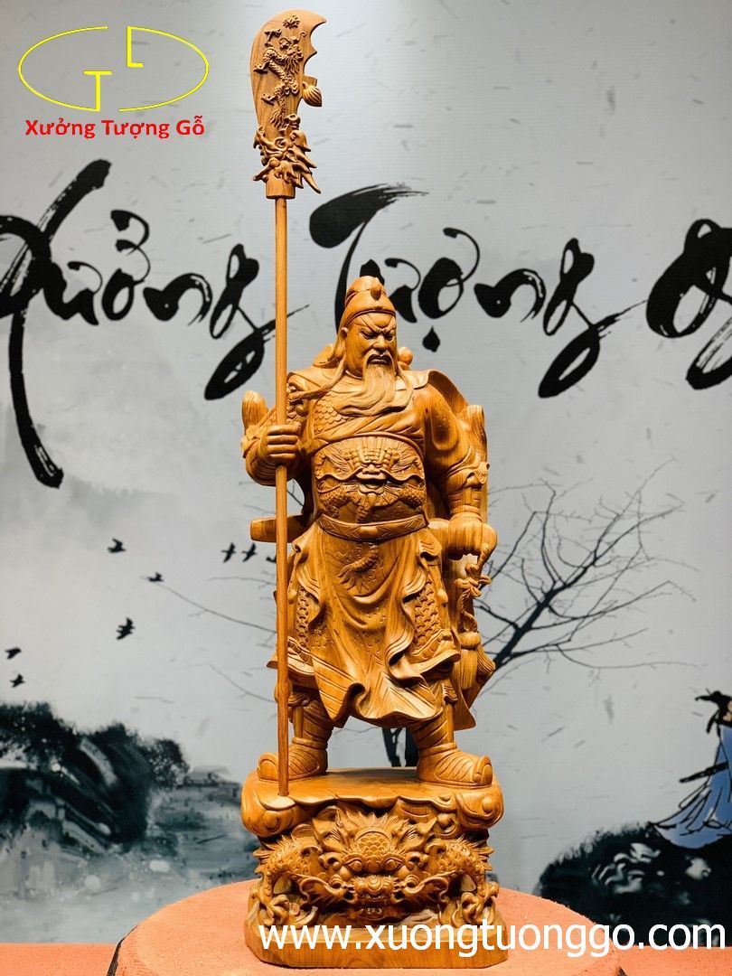 Quan công cầm đao gỗ hương.