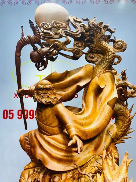 Đạt ma ngọa hổ tàng long gỗ hương.