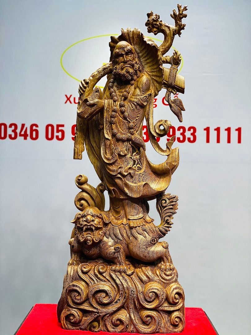 Đạt Ma Đứng Nghê Quá Hải Gỗ Mun Đuôi Công