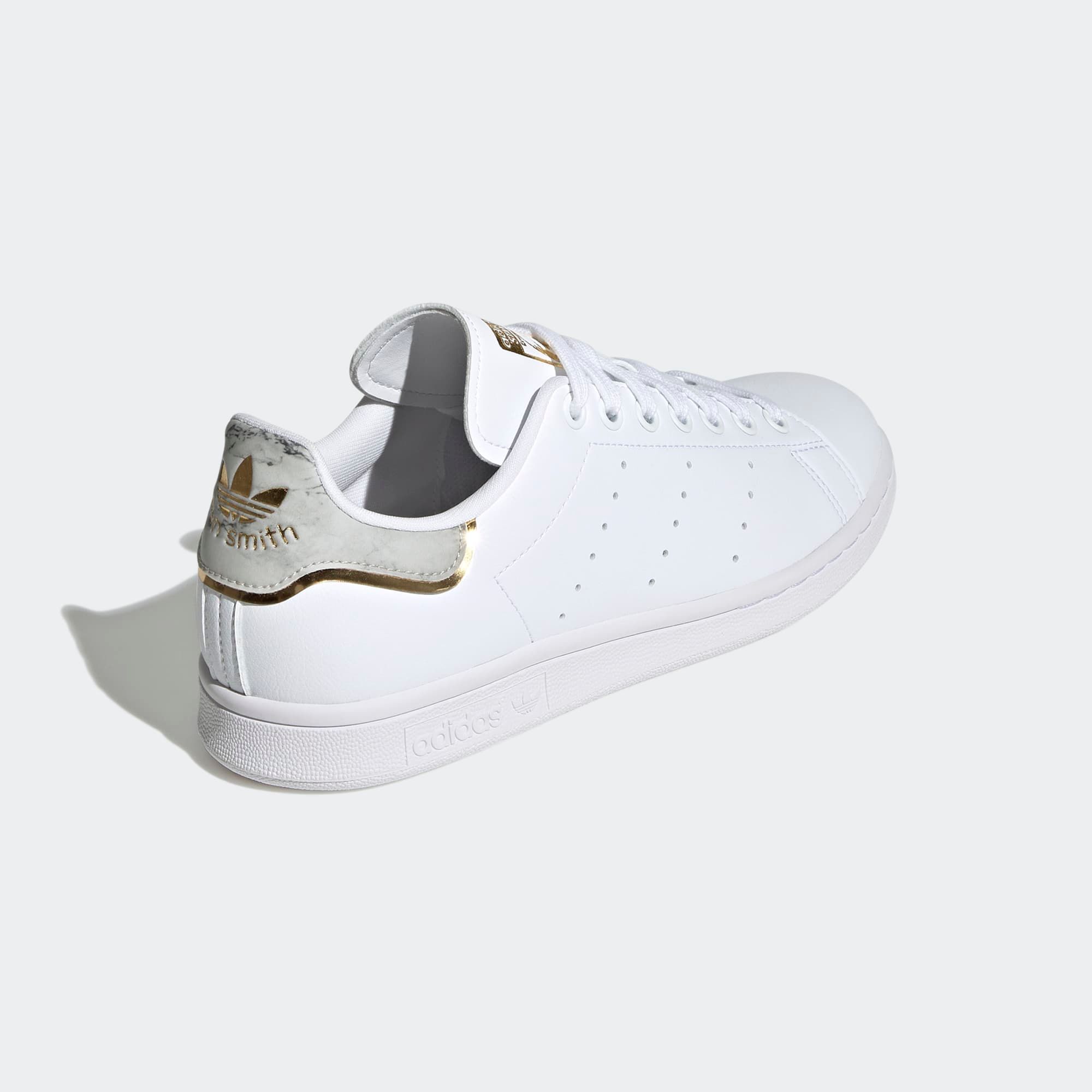 adidas white sneakers with gold