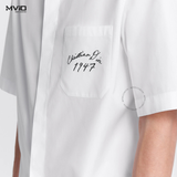  SƠ MI DIOR CỘC TAY TRẮNG CHỮ TÚI NGỰC 1947 493C521A1581 003 