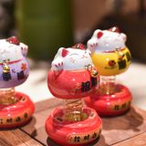 Mèo thần tài lúc lắc