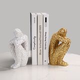 Mô hình trang trí, chặn sách - Người ôm chân