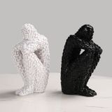 Mô hình trang trí, chặn sách - Người ôm chân