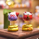 Mèo thần tài lúc lắc