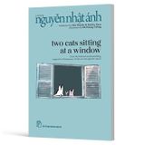 Two Cats Sitting At A Window