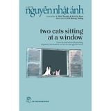 Two Cats Sitting At A Window