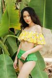  Đồ bơi hai mảnh hoa vàng phối quần xanh 