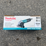 Máy mài góc Makita M9509B có hộp giấy đi kèm khi đựng thân máy