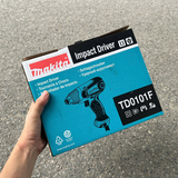 Máy vặn vít cầm tay dó đèn Laser Makita TD0101F có hộp giấy đựng tiện lợi