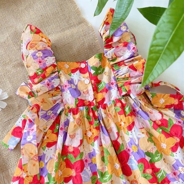  Đầm tay bèo nhún thun nơ 2 bên - Hoa cam 