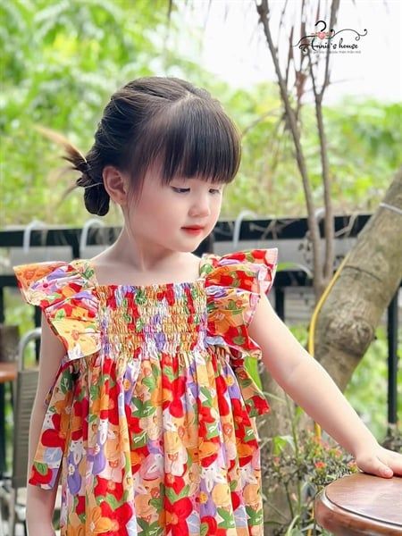  Đầm tay bèo nhún thun nơ 2 bên - Hoa cam 