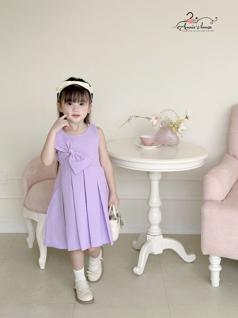  Đầm tím nơ xếp pli 