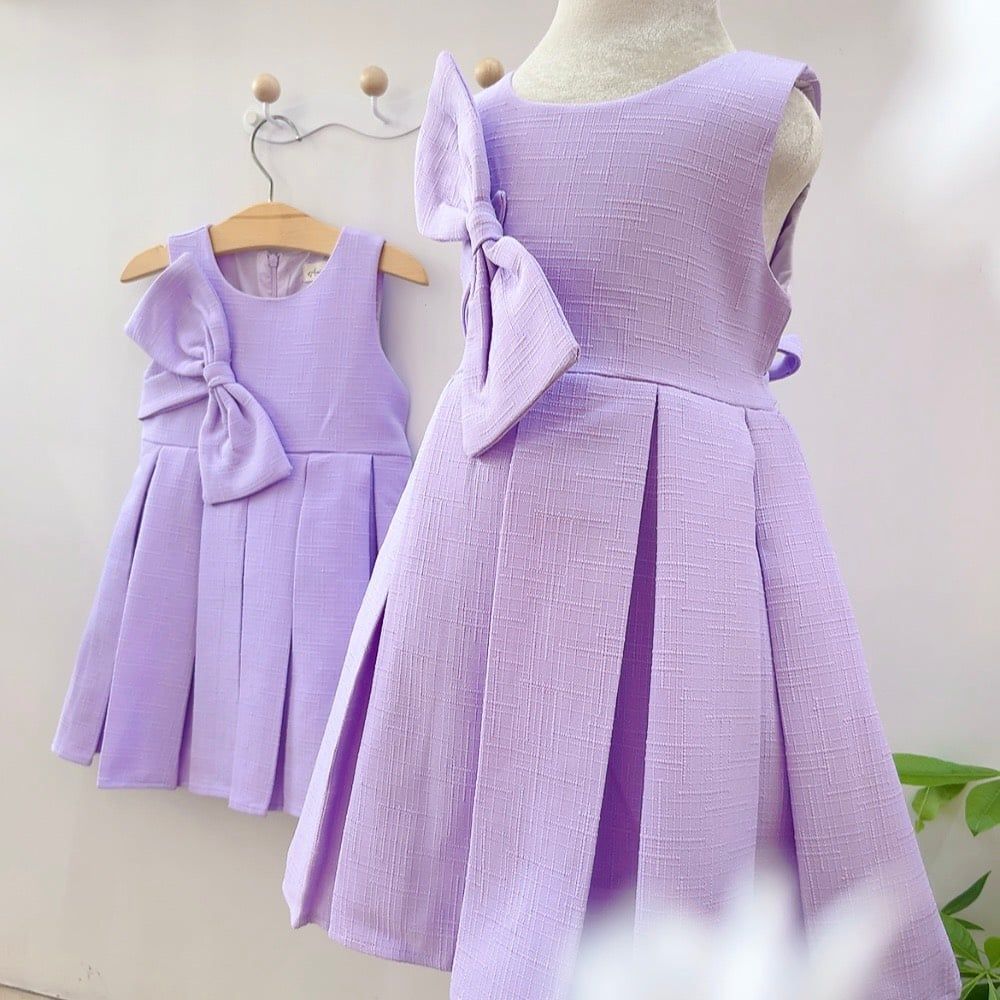  Đầm tím nơ xếp pli 