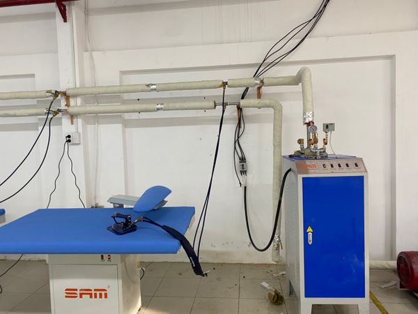 Thi Công Lắp Đặt Dây Chuyển Ủi Hơi Công Nghiệp