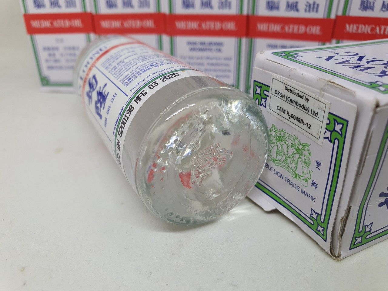  Dầu nóng kwan loong medicated oil dùng xoa bóp nhức mỏi singapore chính hãng 57ml 