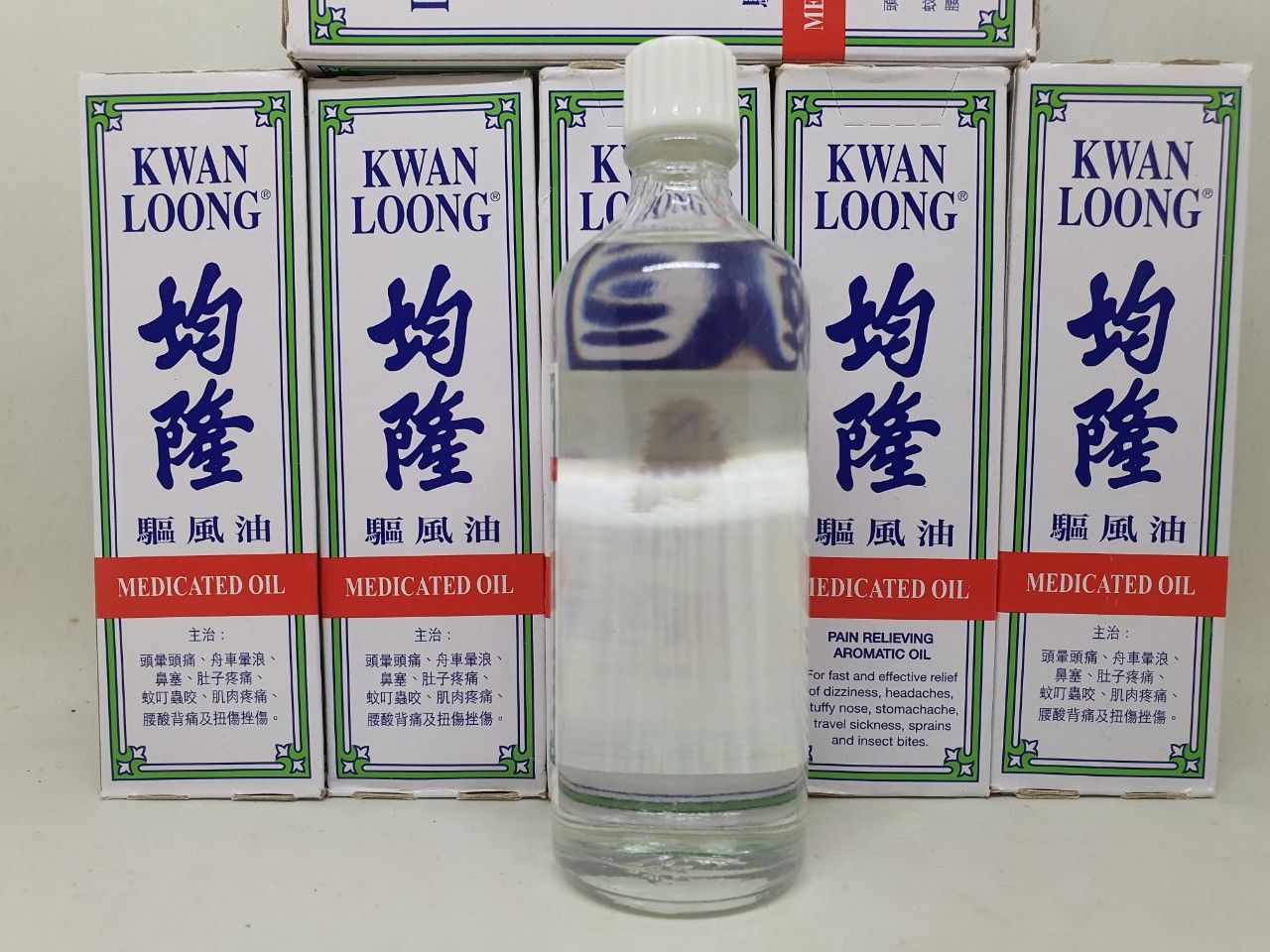  Dầu nóng kwan loong medicated oil dùng xoa bóp nhức mỏi singapore chính hãng 57ml 